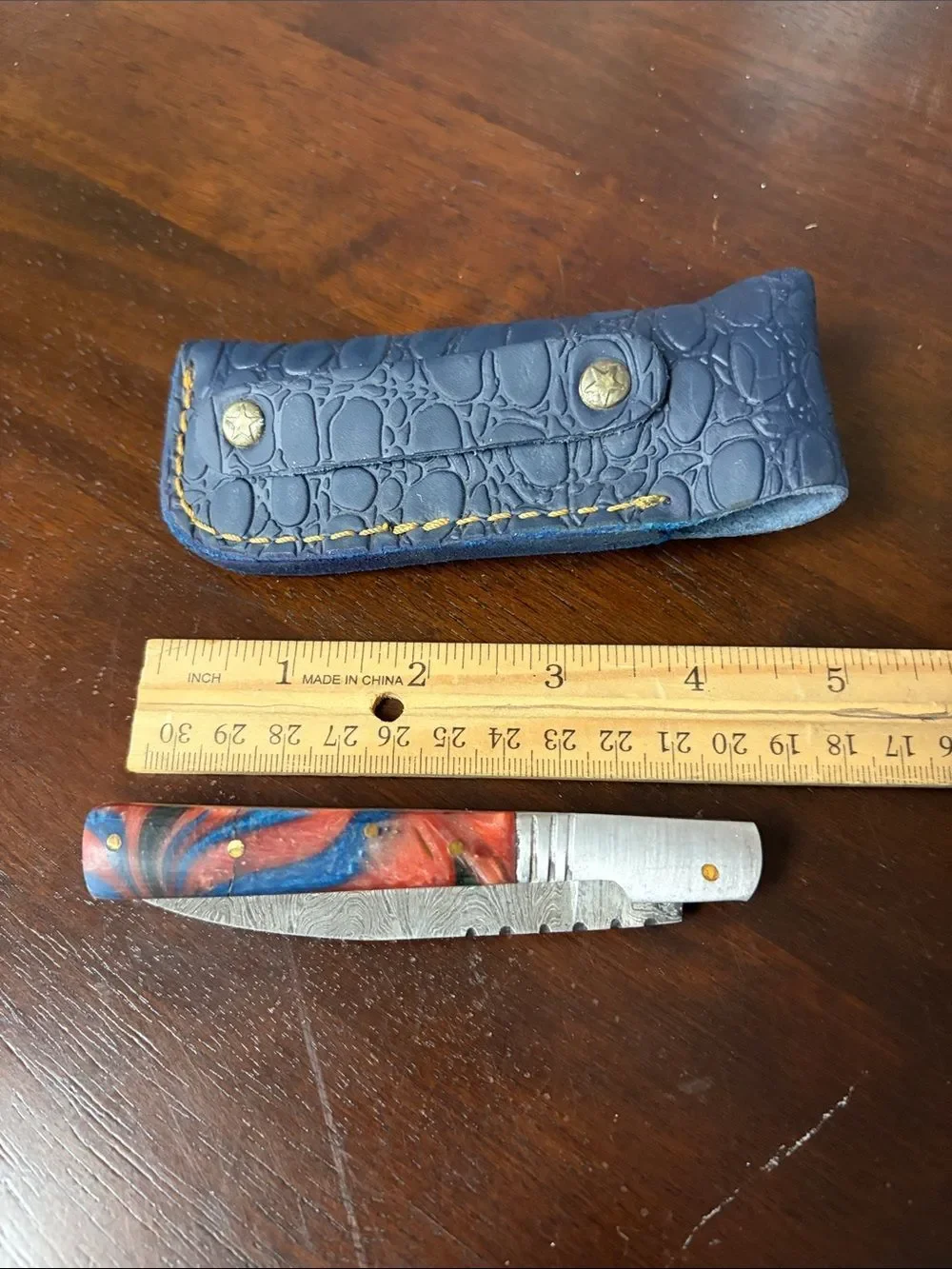 Hand crafted 8” folding Damascus steel